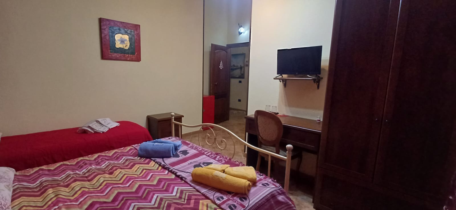 Chambre triple avec trois lits au B&B Stella Sulcitana